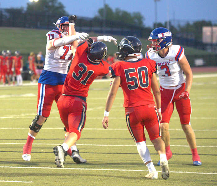Bixby offensive tackle Brody Duffel (left) blocks a Southmoore player during the Spartans' 66-0 win on Sept. 28, 2023.